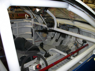Illustration for article titled For $3,700, This 1996 Ford Probe Racer Might Give You A Checkered Future